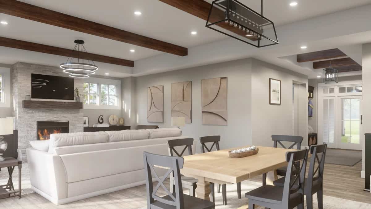The dining area behind the great room offers a wooden dining set for six.