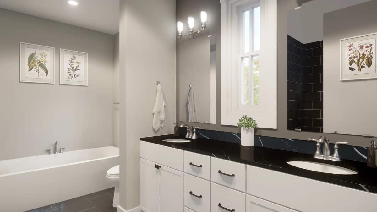 The primary bathroom offers a dual sink vanity and a soaking tub.