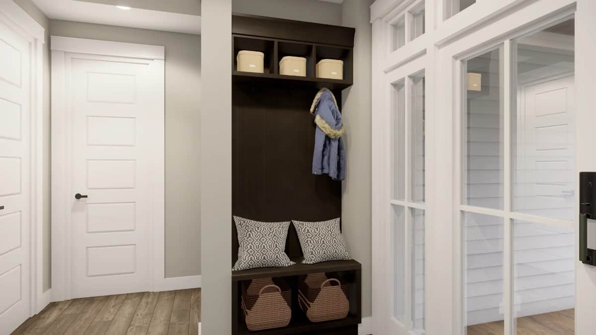 The foyer offers a coat rack integrated with storage shelves and a built-in bench.