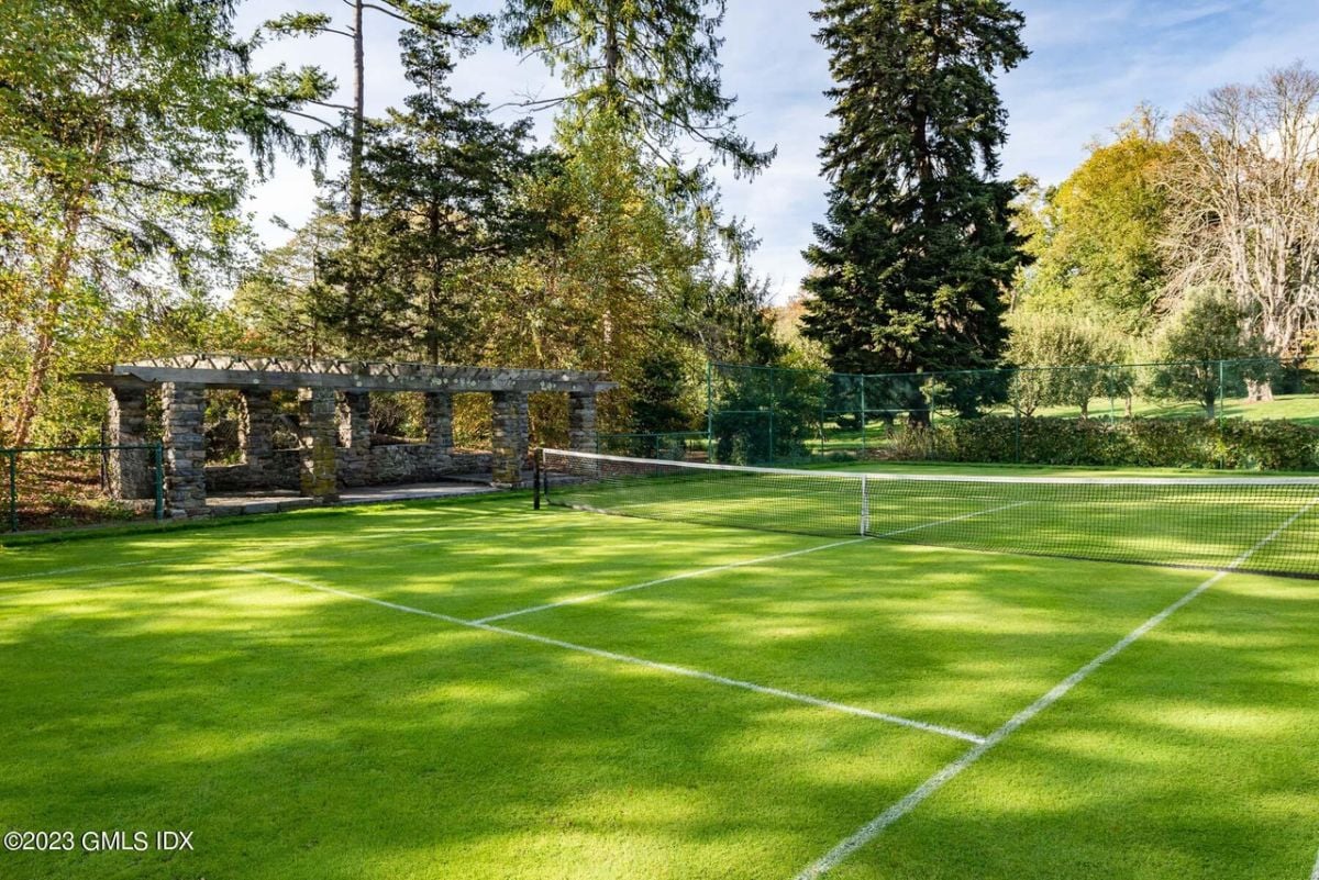 Grass tennis court.