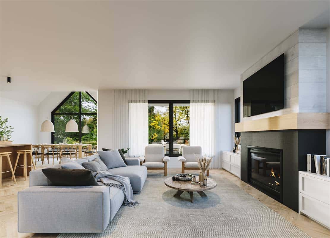 The living room has modern seats and a large TV mounted above the fireplace.