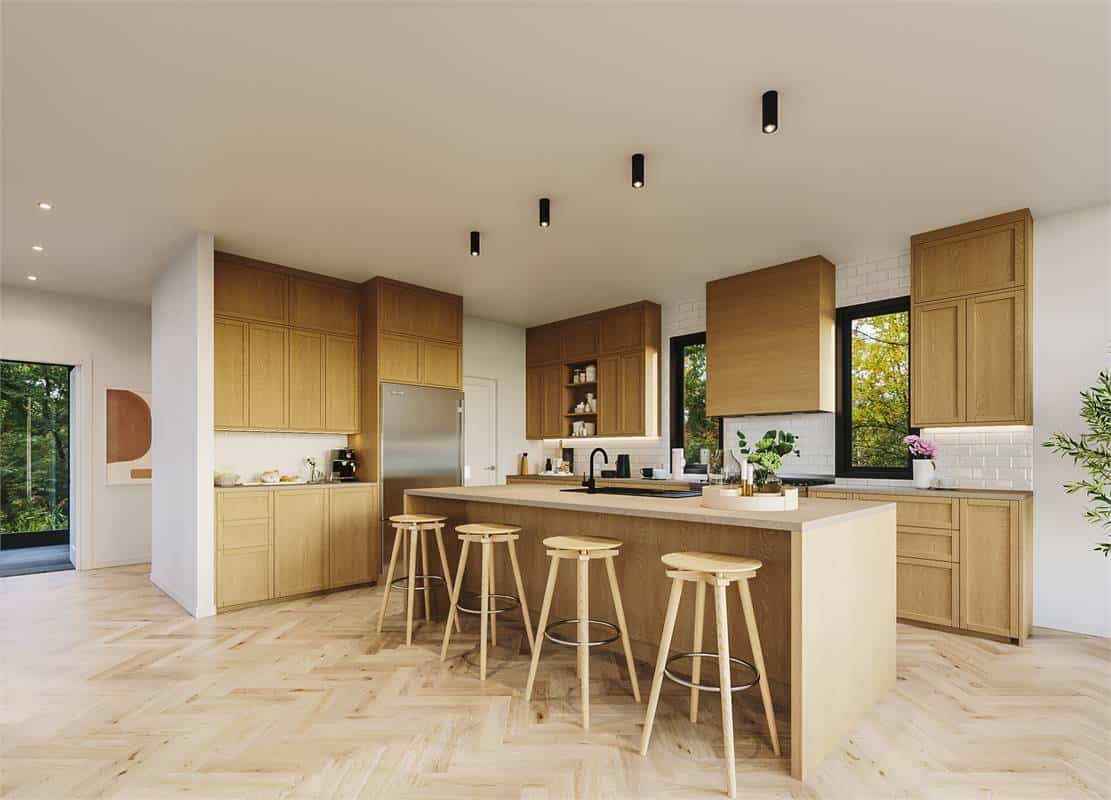 The kitchen features a cohesive look with natural wood cabinetry and a matching island blending in with the parquet flooring.