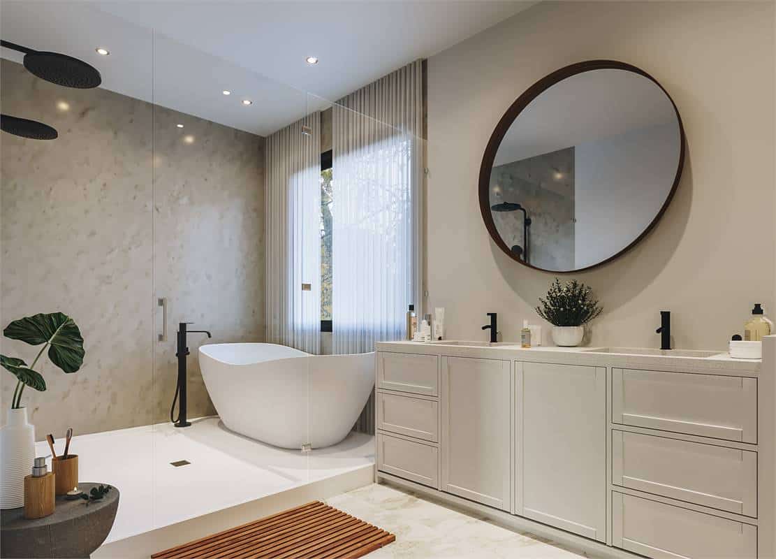 The wet room offers two showerheads and a freestanding tub situated under the window.