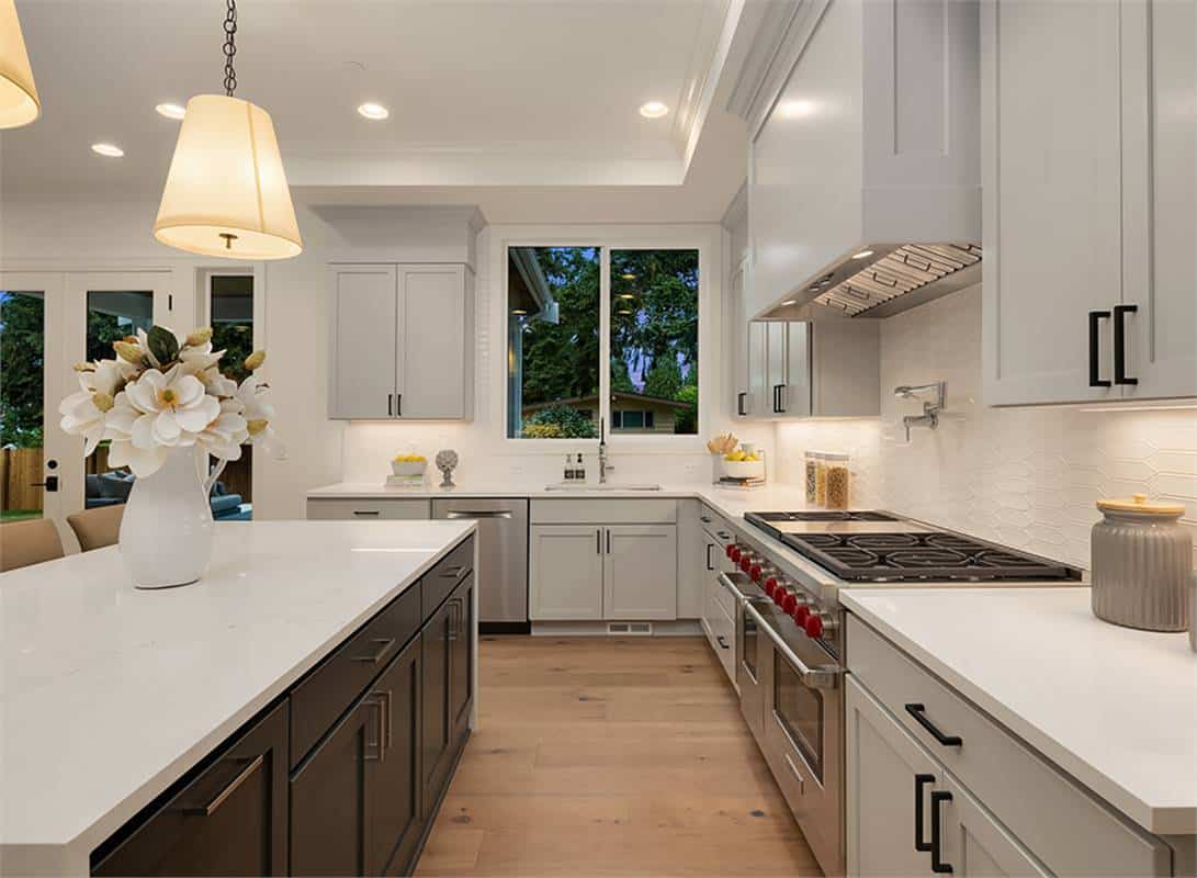 Sliding windows above the sink bring natural light into the kitchen.