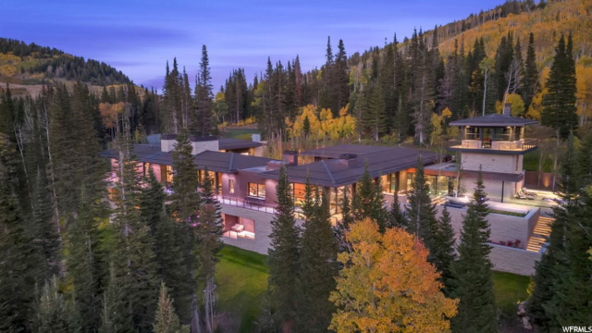 Aerial night view of the mansion.