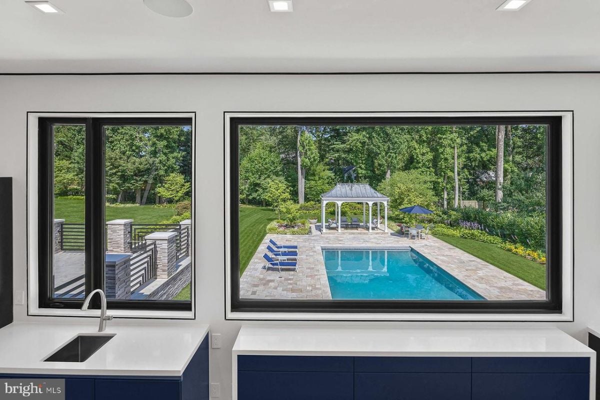 A view of the outdoor pool from the kitchen window.