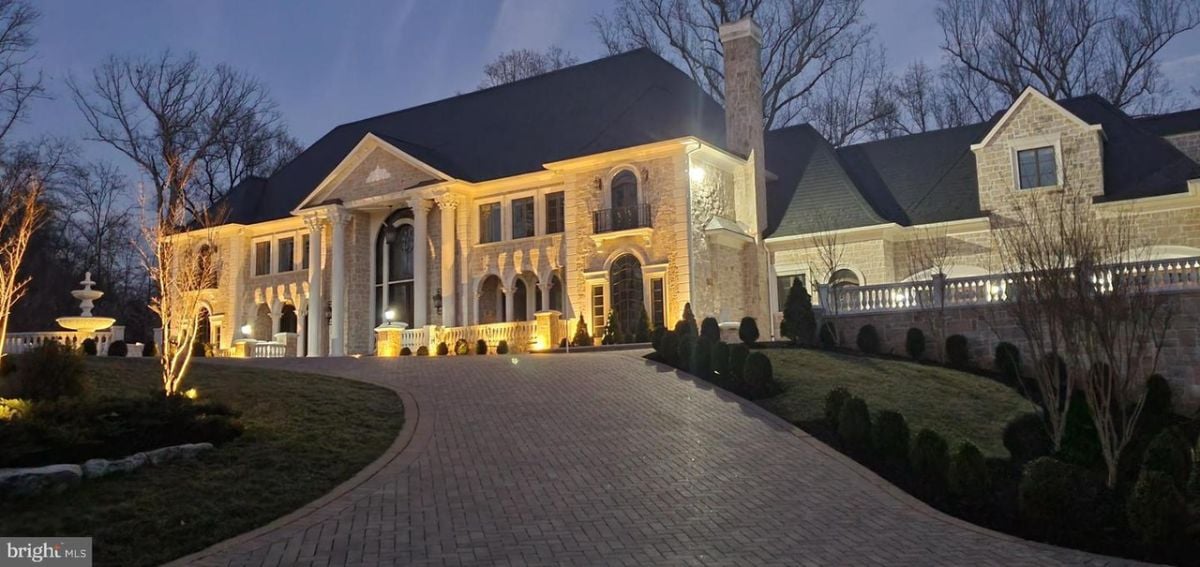 A huge mountain with a driveway.