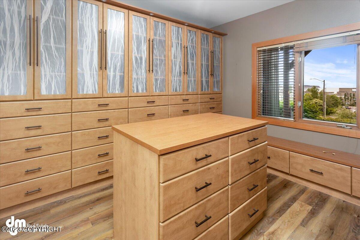 A room with cabinets and a window.