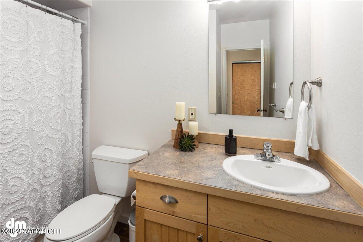 Bathroom with a sink and toilet.