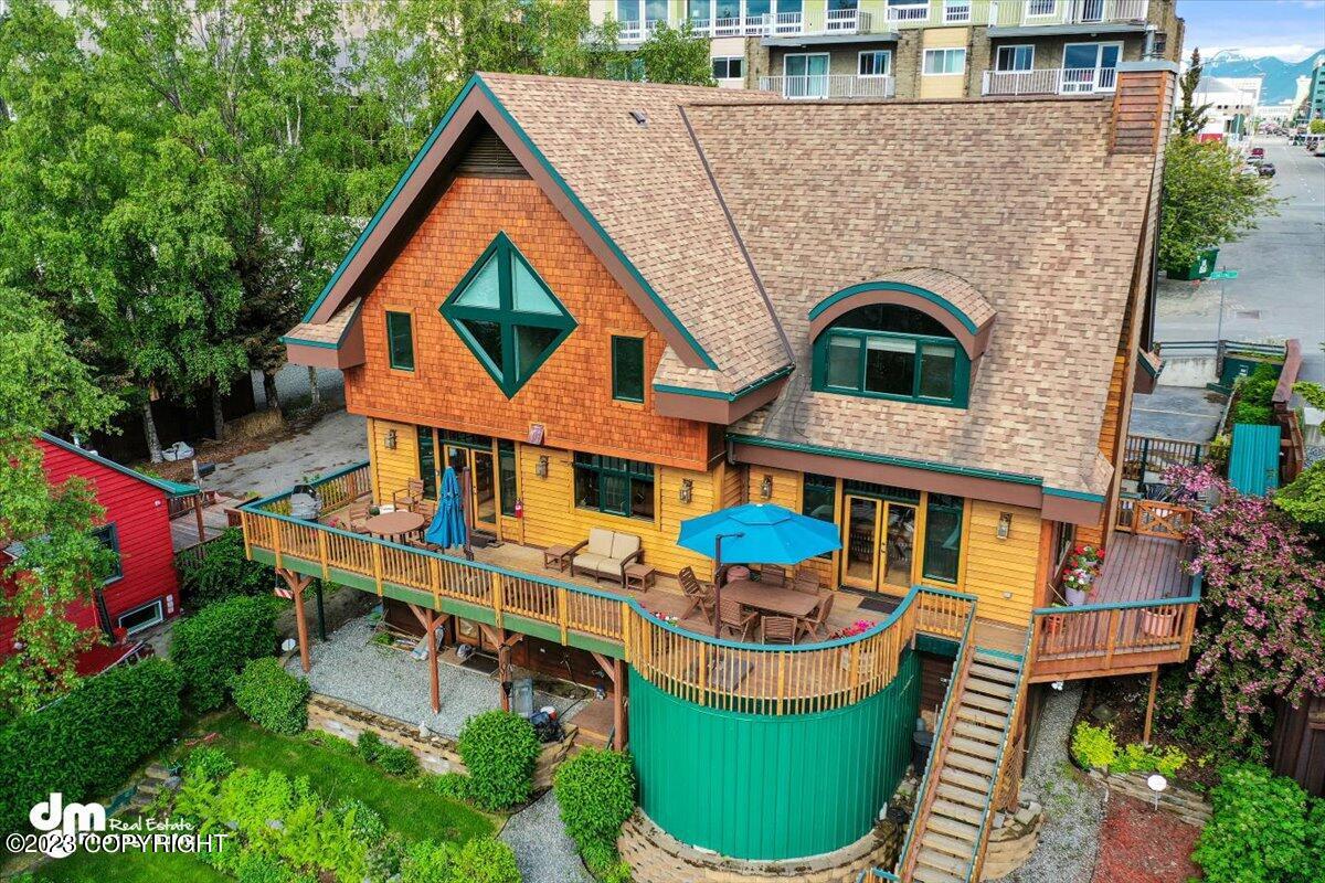 Aerial view of the backyard, deck and patio.