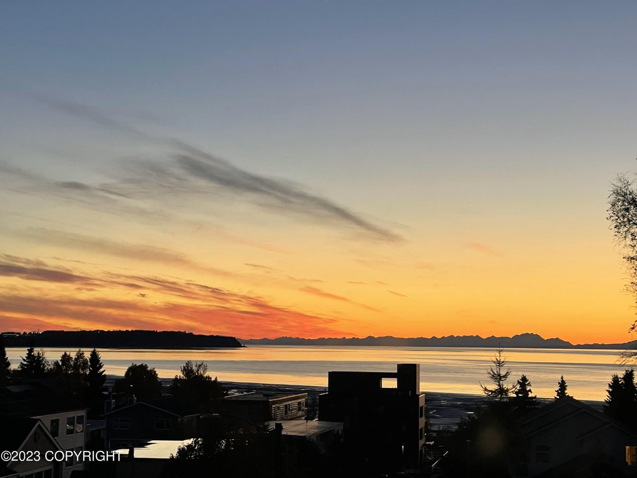 A sunset view from the balcony of the house.