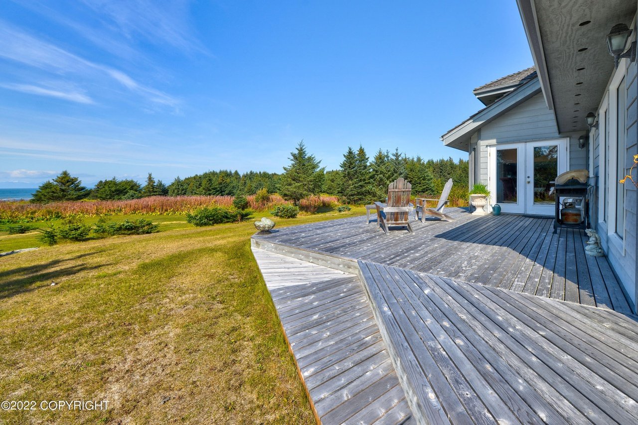 Deck with views of the ocean.