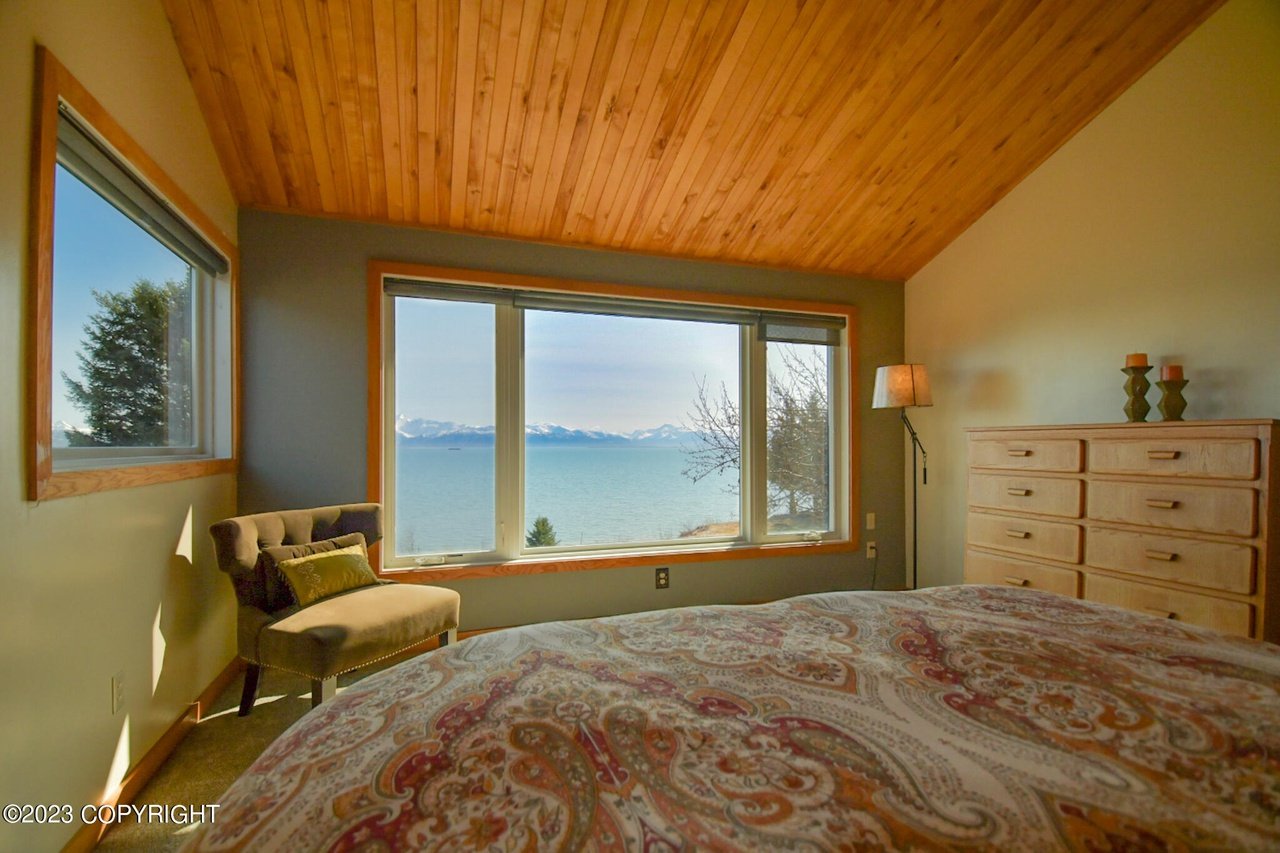 Master bedroom with a view of the mountains.