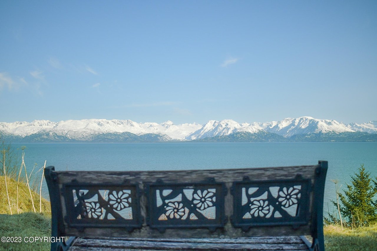 A bench with a view of the mountains.