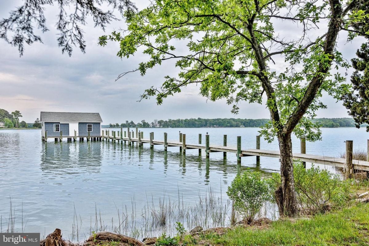 A boathouse sits on a dock.