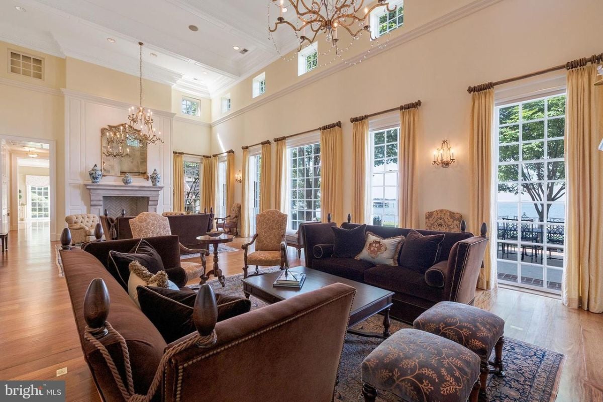 Formal living room with couches and chairs.