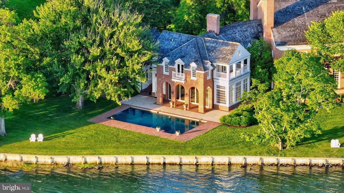 Aerial view of the mansion with the pool.