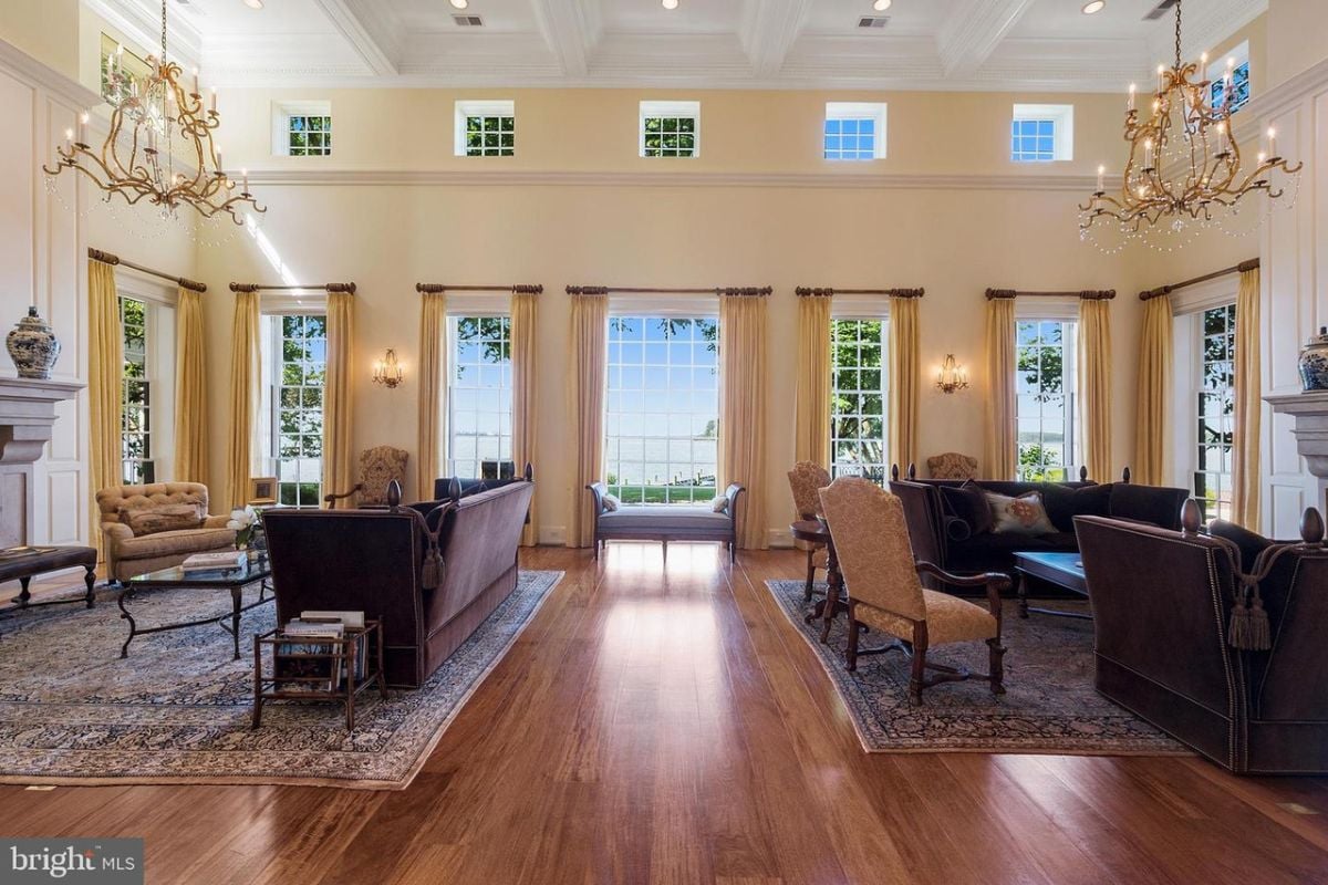Large living room with a large window.