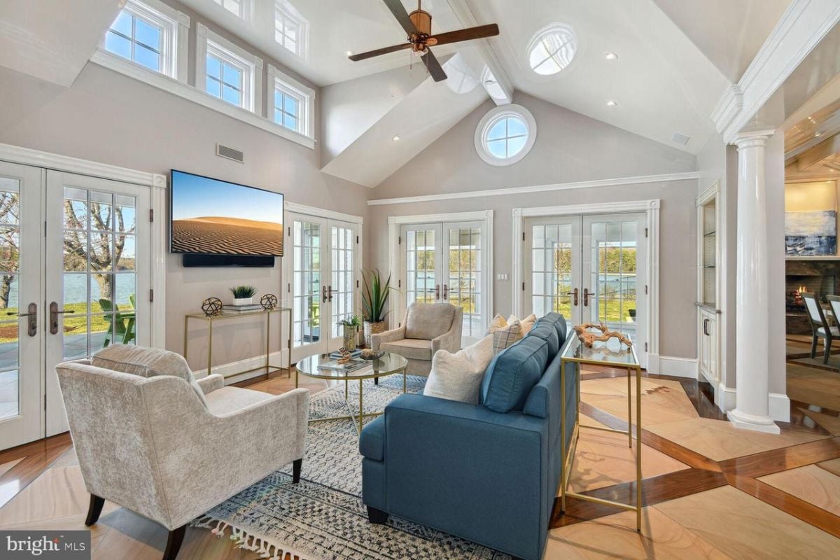 A living room with a television and a couch.