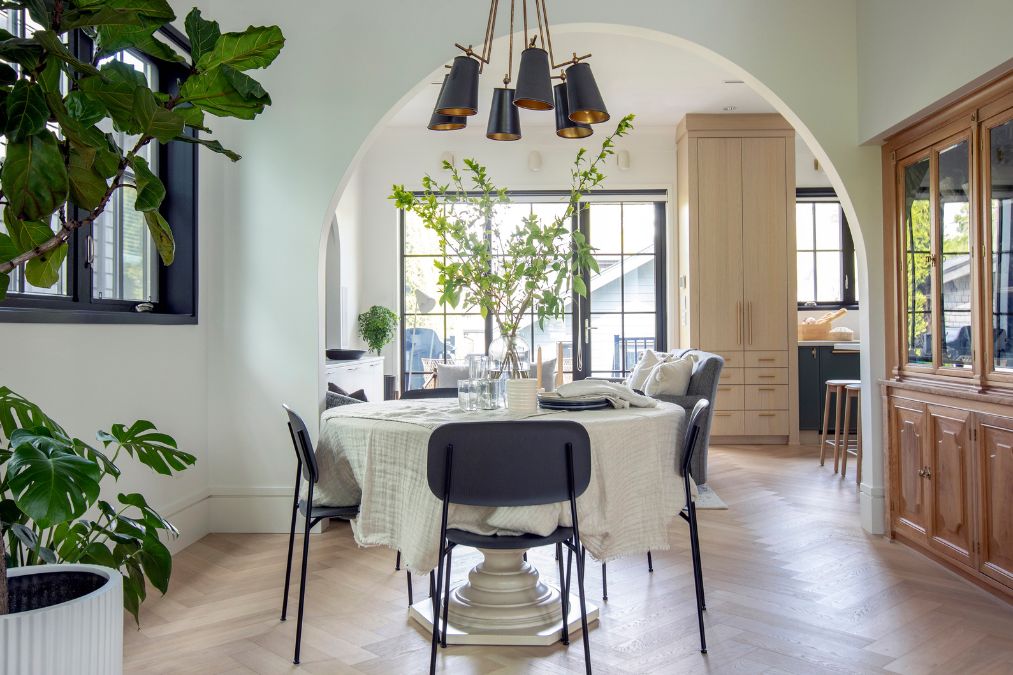 Dining room with round table and ceiling light
