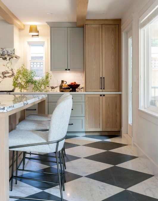 Kitchen with chairs and cabinet