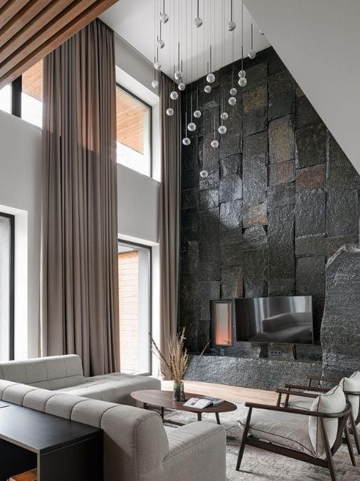 A living room with center table and TV
