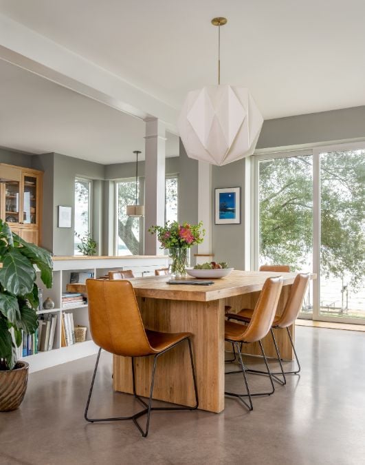 Dining room with wooden table and shelf