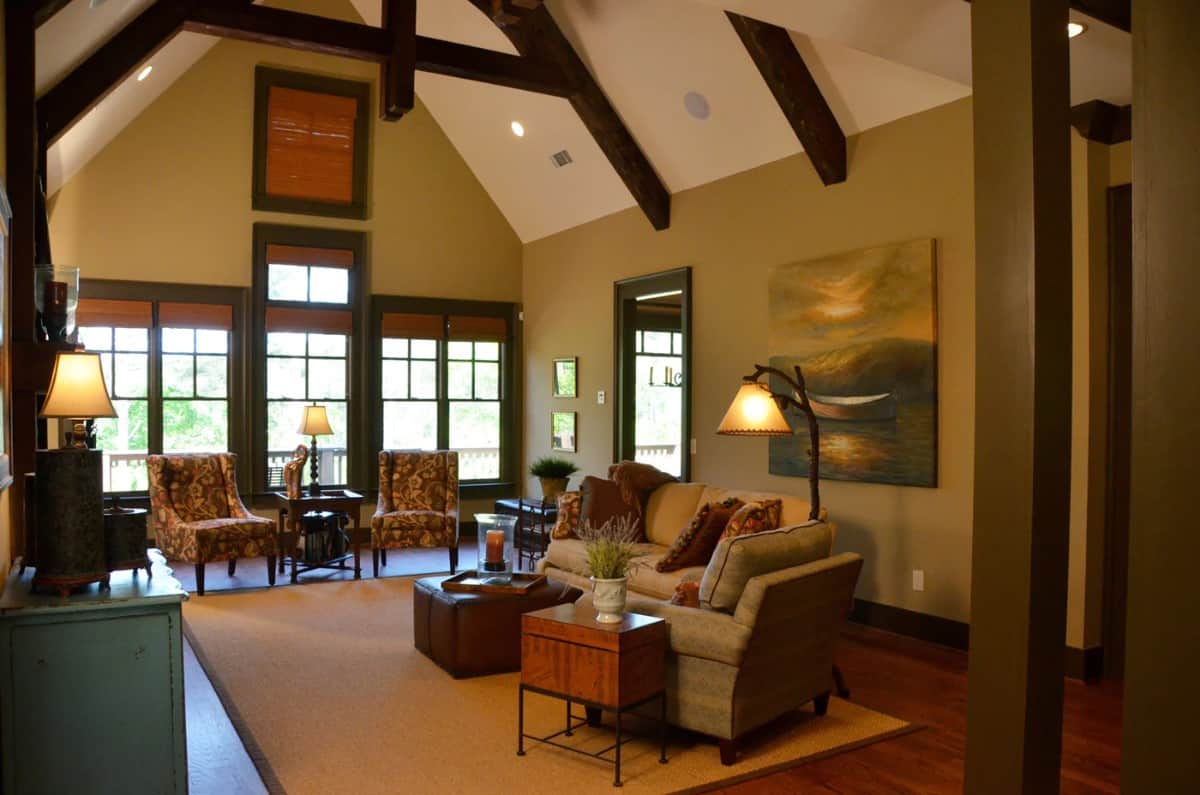 A glazed door extends the grand room onto a covered porch.