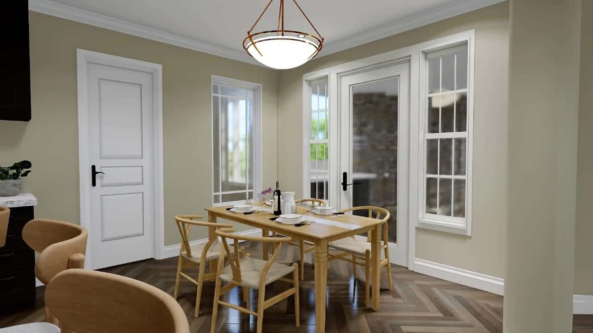 Dining room with a wooden dining set and covered porch access through a glazed door.