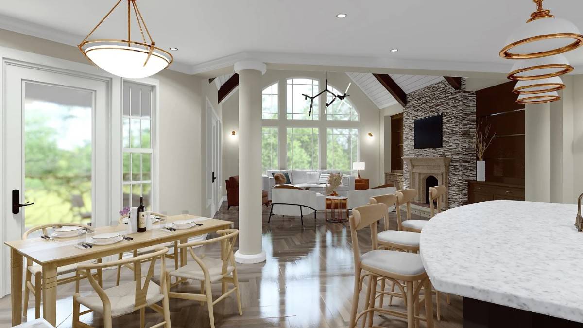 An open layout view of the kitchen, dining area, and vaulted lodge room.