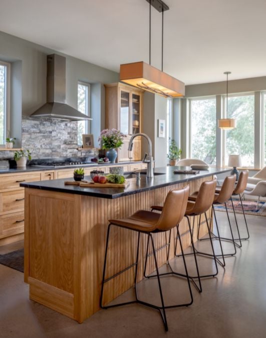 Kitchen with center island and chairs