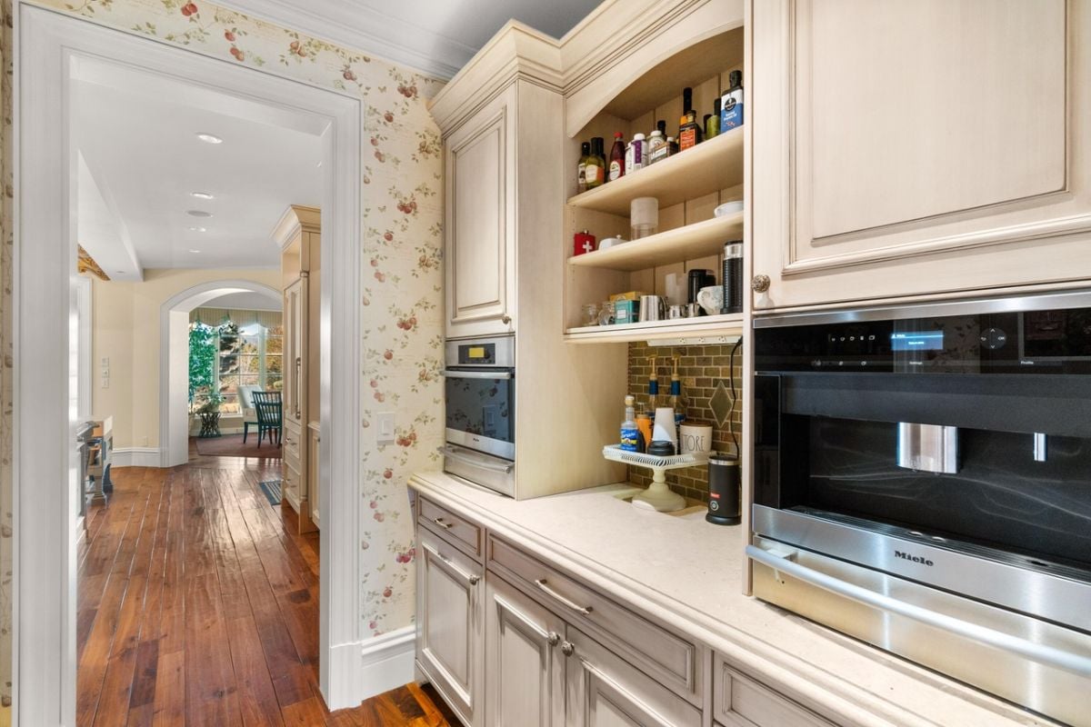 Pantry with custom cabinets and drawers.