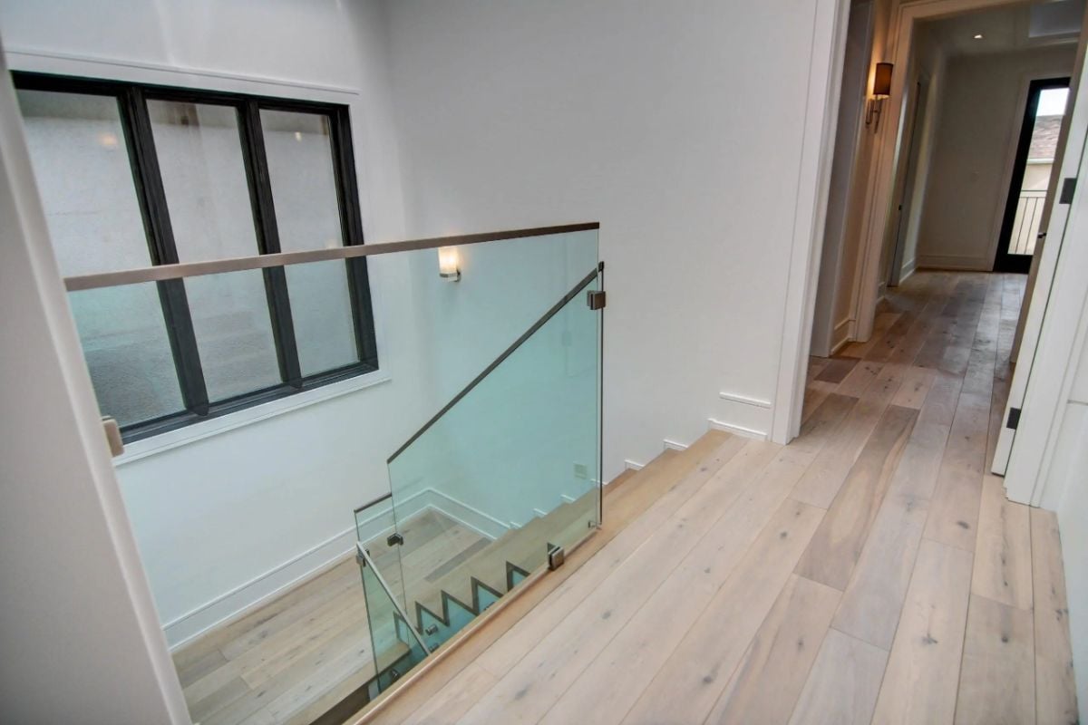 Staircase with glass railings.