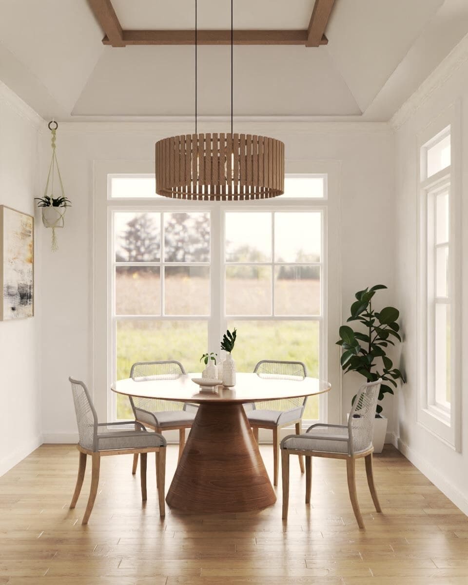 Breakfast nook with a round dining set and a wooden pendant that hangs from the coved ceiling.