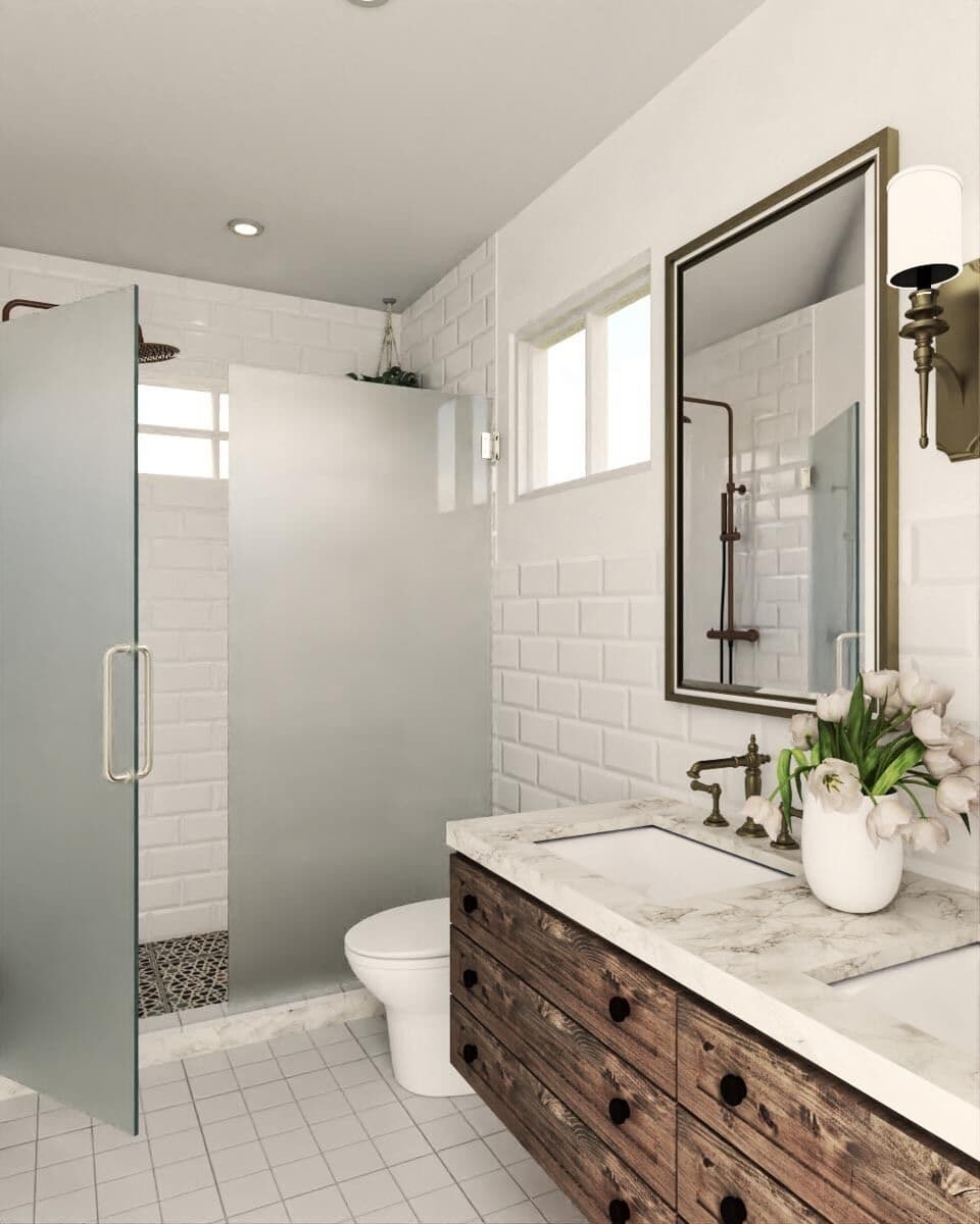 Primary bathroom with a walk-in shower and a floating vanity with two sinks and a marble countertop.