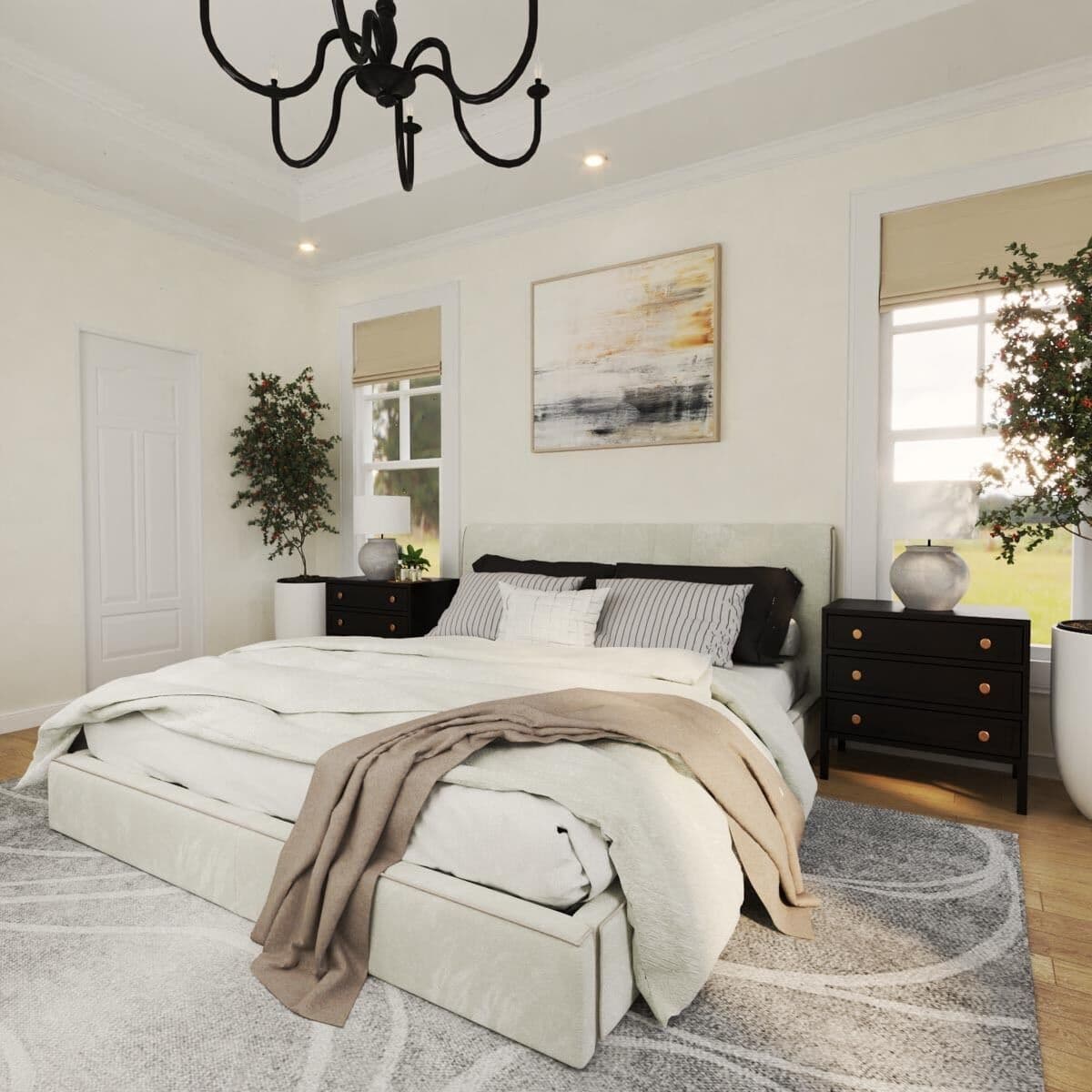 Primary bedroom with an upholstered bed, black nightstands, and a tray ceiling mounted with a wrought iron chandelier.
