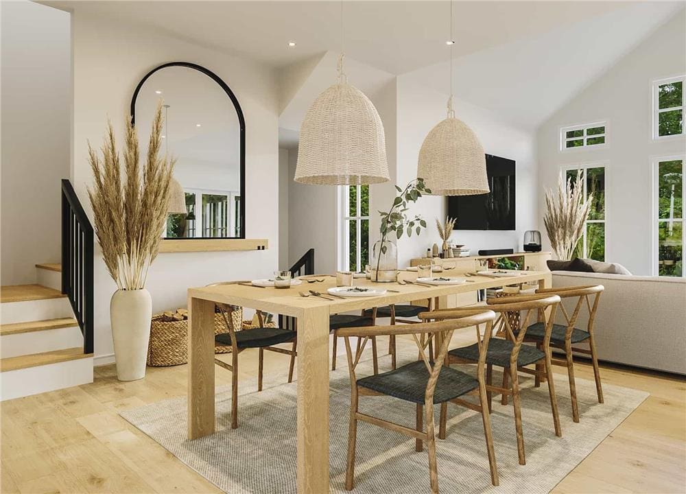 Dining room with a wooden dining set topped by a couple of wicker pendants.