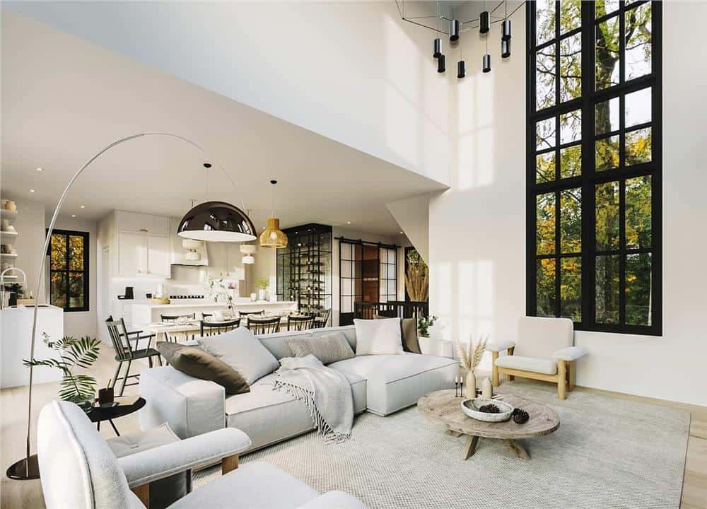 A tall window fills the living room with natural light.