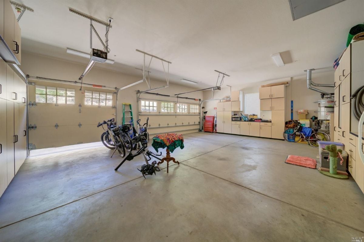 Garage with a bike and a bike rack.