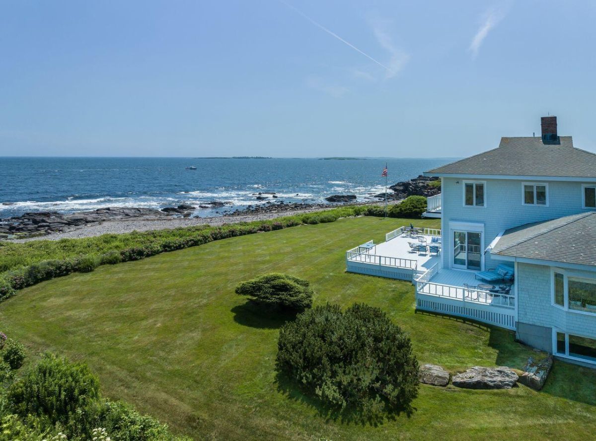 Aerial view of the house with a view of the ocean.