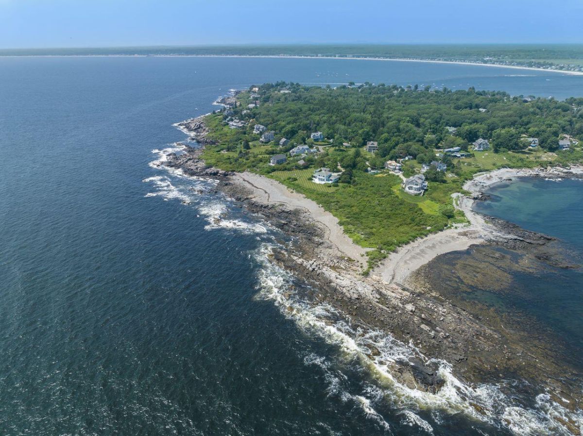 Aerial view of the property with a view of the ocean.