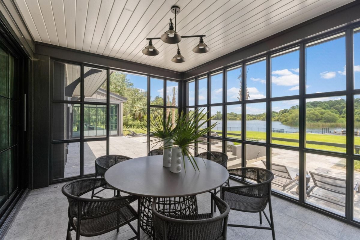 Porch with sitting area overlooking the lake.