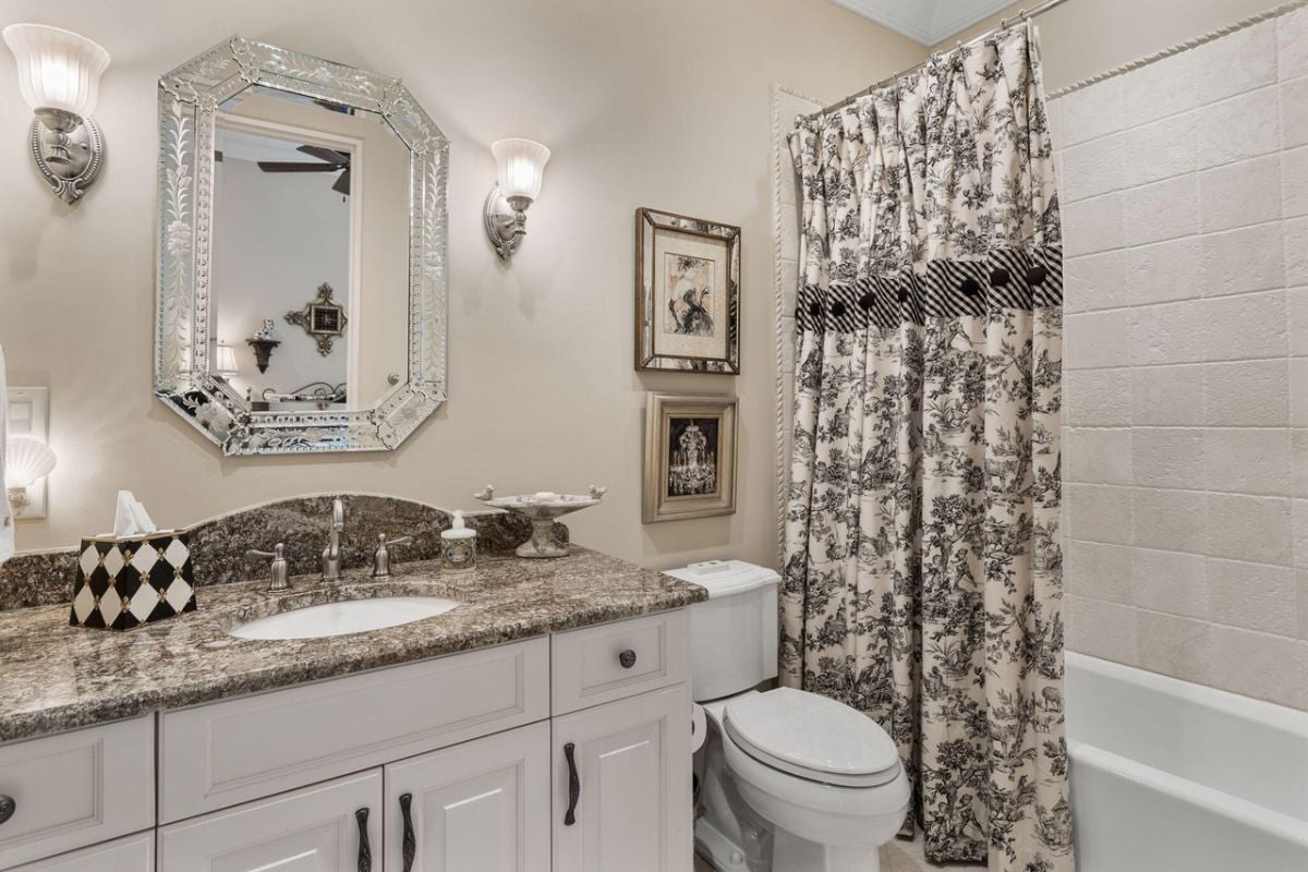 Bathroom with a sink, a bath tub and a toilet.