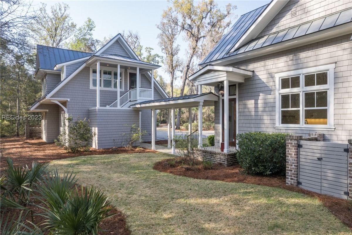 Guest house with a landscaped front yard.