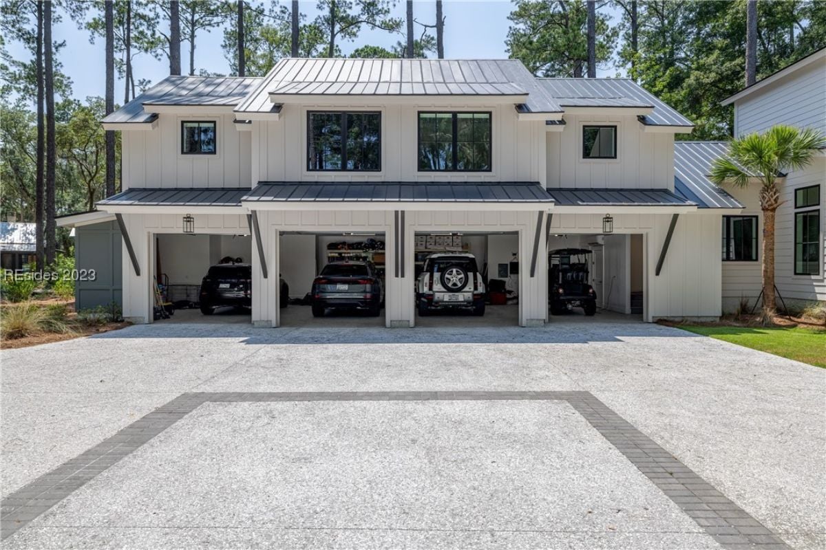Spacious garage with spacious driveway.