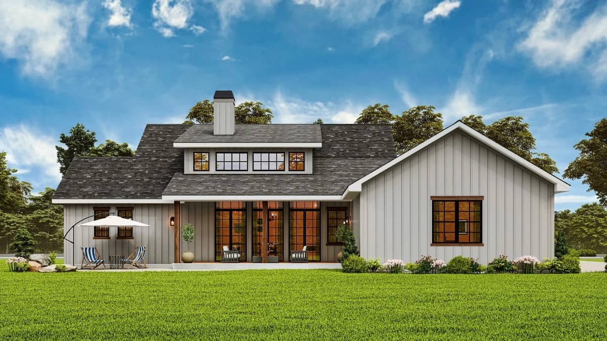 Rear rendering with a covered entry porch topped with a large shed dormer.
