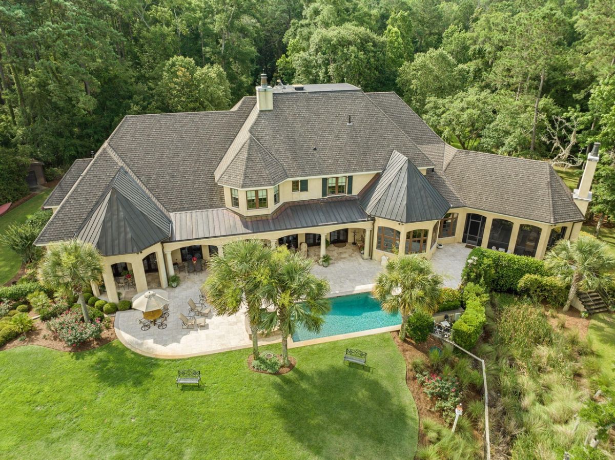 Aerial view of the property with a pool.