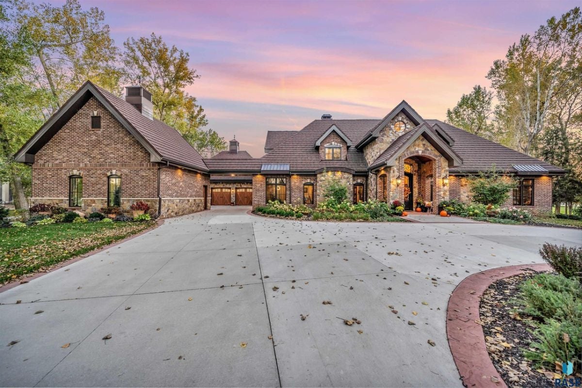 Front view of the house with spacious driveway.