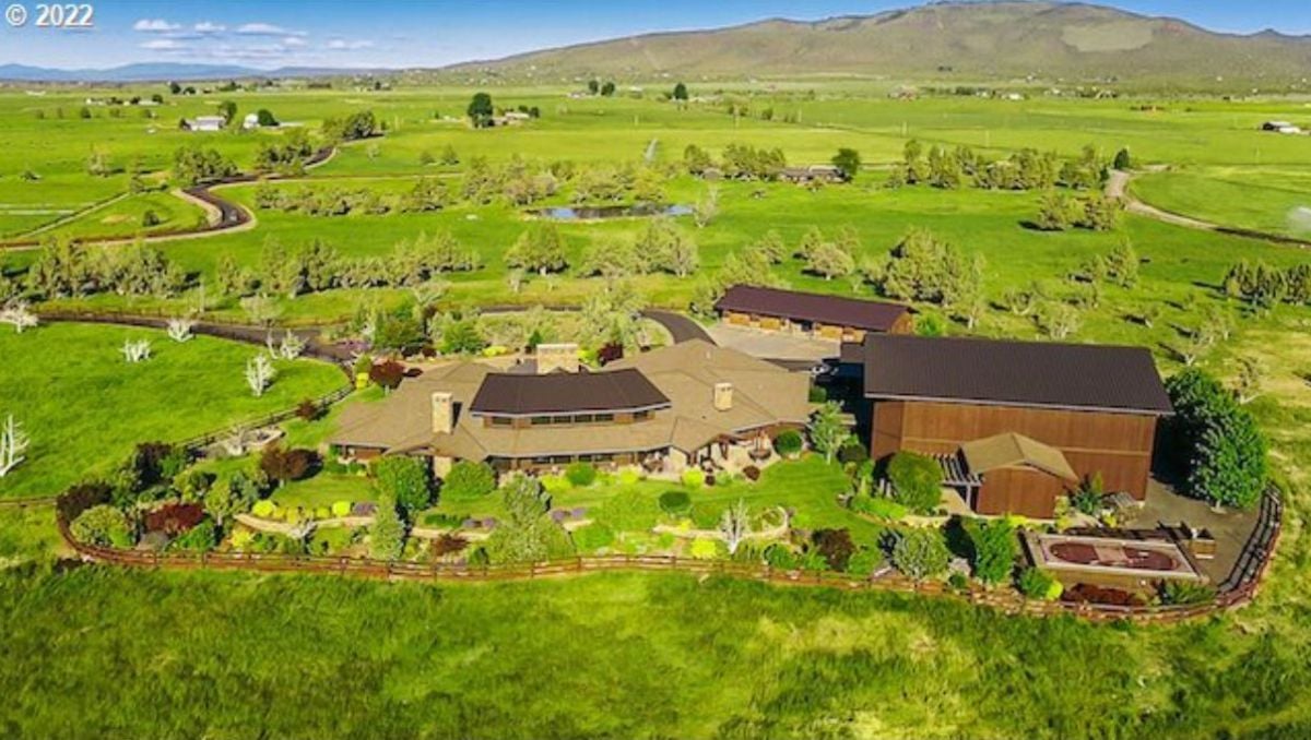 Aerial view of the Front view of the 8,863 Sq. Ft. Estate in Powell Butte, OR.
