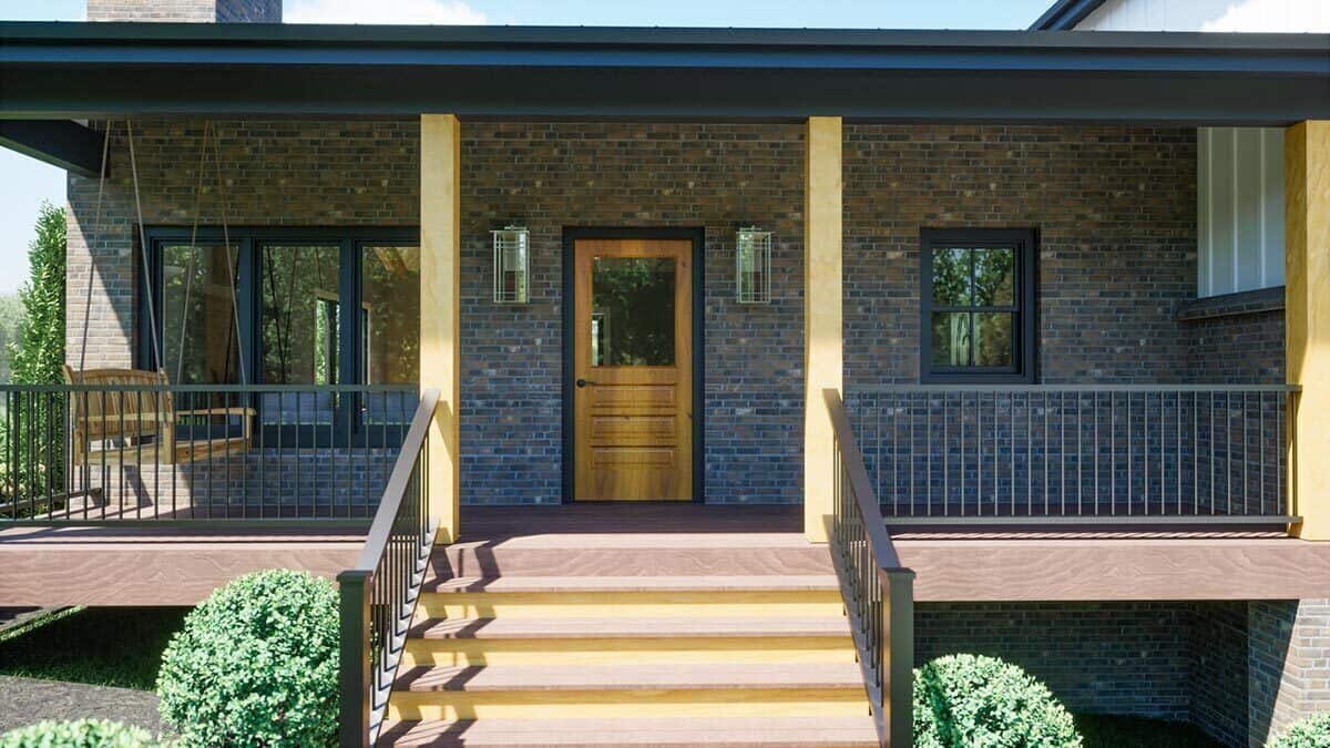 Front deck with a wooden stoop, a glazed door, and a swinging bench.